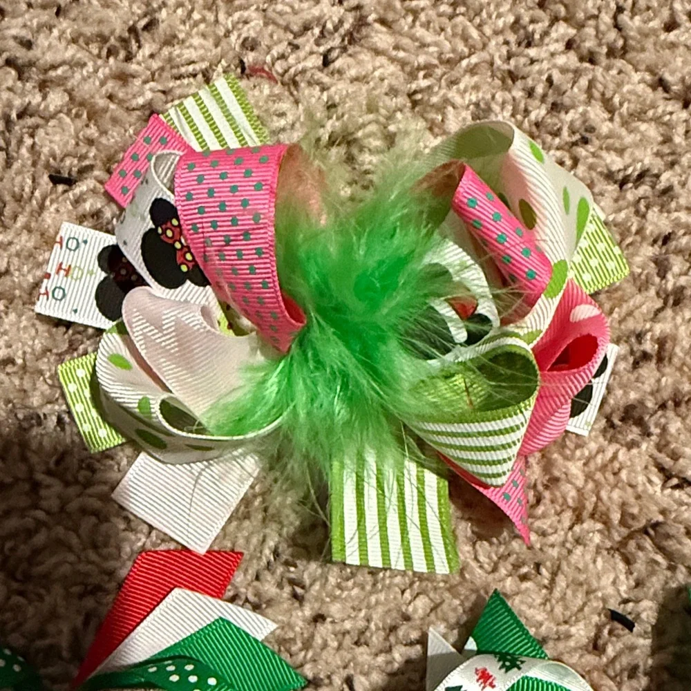 Girls 5 Christmas bows top bow is a custom Micky and Minnie Christmas bow